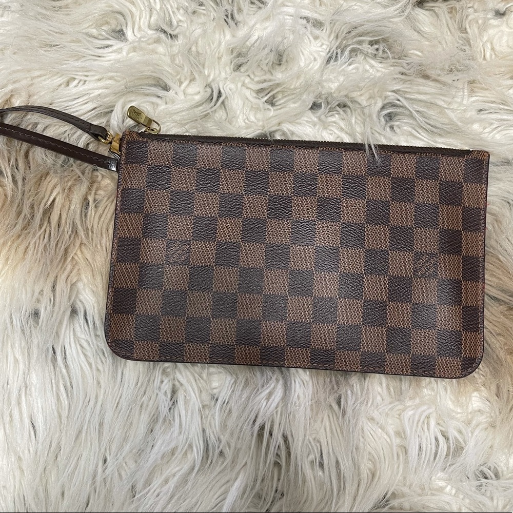 NOT AVAILABLE. Louis Vuitton Neverfull Ebene pouch